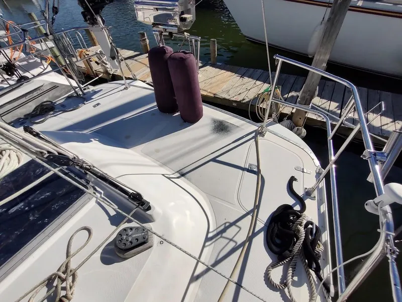Slide: The Image of Sailboat deck view, Hylas 46, 1997 model, docked with ropes and fenders. - 23