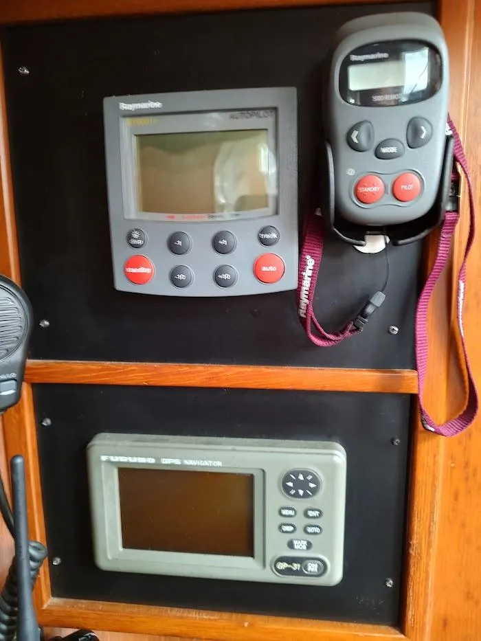 Slide: The Image of Navigation equipment on a 1997 Hylas 46 yacht, featuring Raymarine and Furuno devices. - 38
