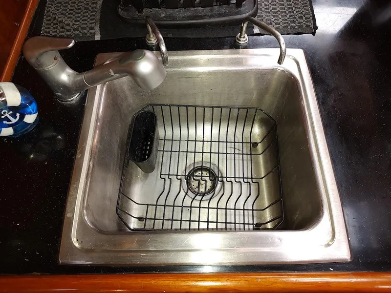Slide: The Image of Stainless steel sink with faucet on Hylas 46 yacht, 1997 model. - 43