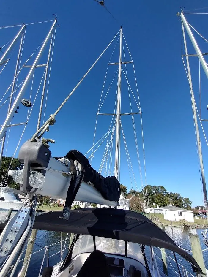 Slide: The Image of Sailboat mast and rigging of a 1997 Hylas 46 under clear blue sky. - 8