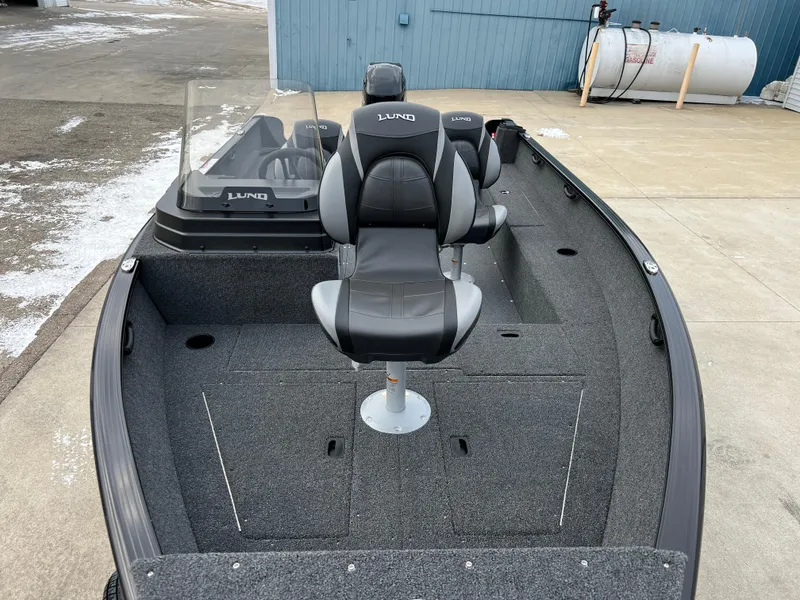 Slide: The Image of 2025 Lund 1650 Rebel XL SS Blackout boat with sleek seating and spacious deck. - 7