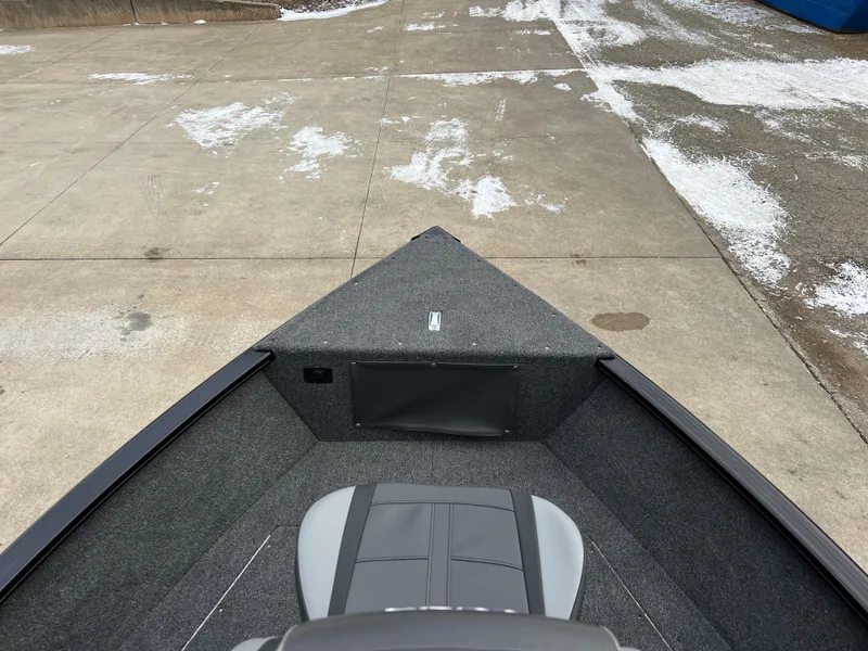 Slide: The Image of 2025 Lund 1650 Rebel XL SS Blackout boat interior, featuring a sleek, modern design. - 8