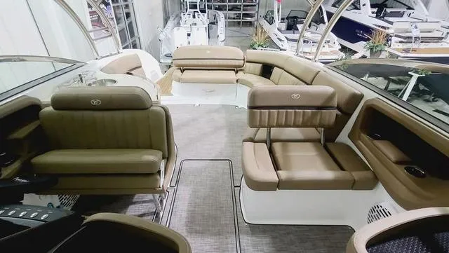 Slide: The Image of Luxurious interior of 2022 Cobalt R35 boat with tan leather seating. - 6
