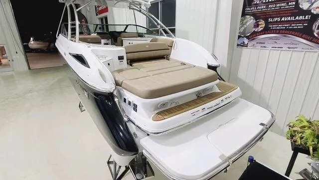 Slide: The Image of 2022 Cobalt R35 boat with spacious seating and swim platform in showroom. - 3