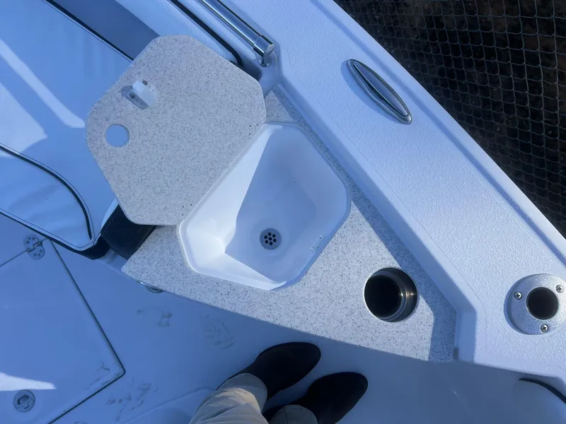 Slide: The Image of 2025 Stingray CC 216 CC boat sink and countertop detail. - 8
