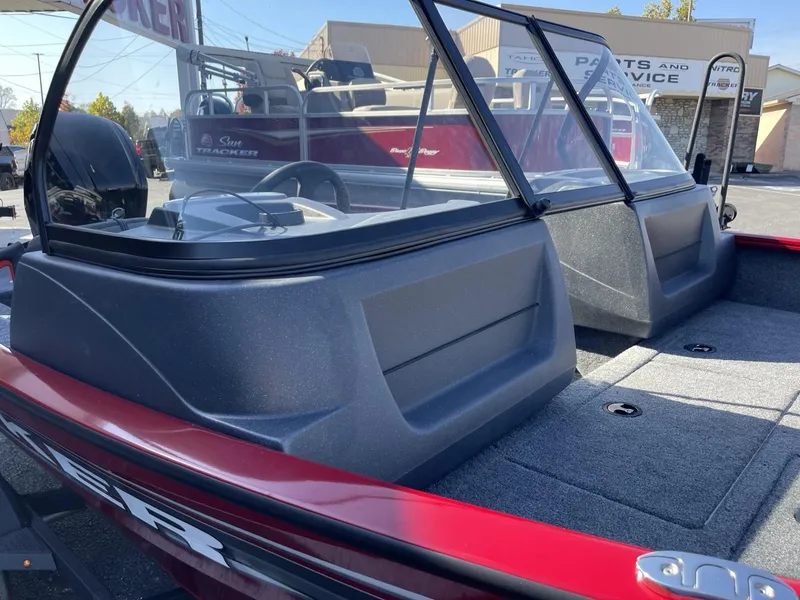 Slide: The Image of 2025 Tracker Pro Guide V-16 WT boat with spacious interior and windshield. - 10