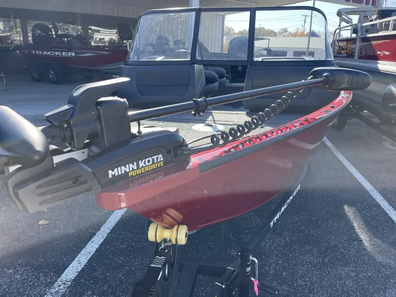 Slide: The Image of 2025 Tracker Pro Guide V-16 WT boat with Minn Kota PowerDrive motor. - 8