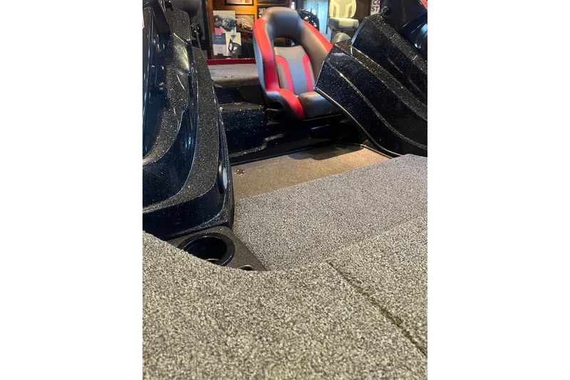 Slide: The Image of Interior of 2025 Nitro Z19 boat with red and gray seating. - 12