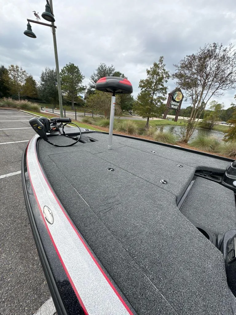 Slide: The Image of 2025 Nitro Z19 boat deck in parking lot, featuring sleek design and modern equipment. - 4