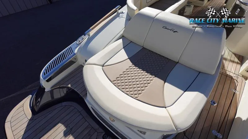 Slide: The Image of 2025 Chris-Craft 28GT boat with luxurious seating, showcased by Race City Marine. - 10