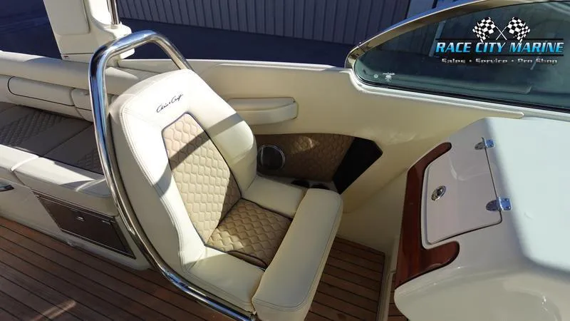 Slide: The Image of Luxurious interior of 2025 Chris-Craft 28GT boat with elegant seating and wood accents. - 29
