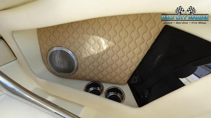 Slide: The Image of 2025 Chris-Craft 28GT interior detail with speaker and cup holders. - 30