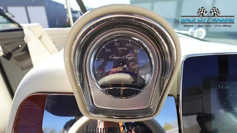 Slide: The Image of 2025 Chris-Craft 28GT speedometer, Race City Marine branding visible. - 42