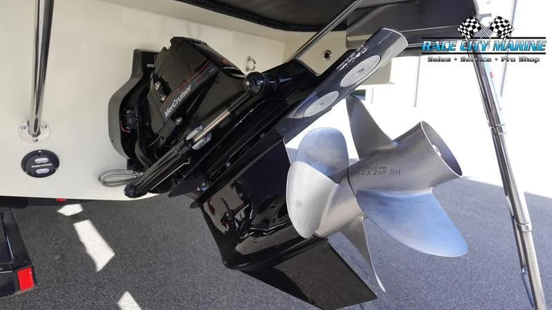 Slide: The Image of 2025 Chris-Craft 28GT boat propeller and engine detail at Race City Marine. - 8