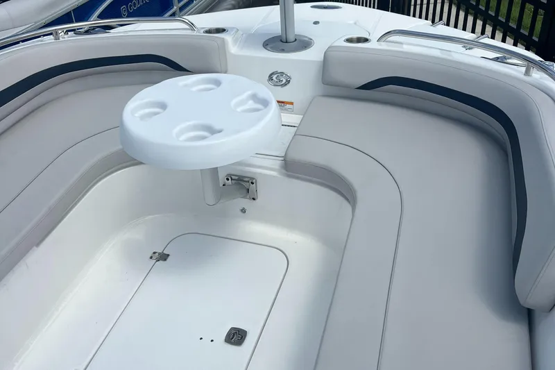 Slide: The Image of 2024 Hurricane Center Console SS 231 OB boat interior with seating and table. - 16