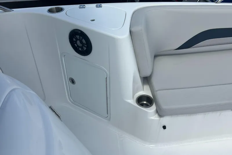 Slide: The Image of 2024 Hurricane Center Console SS 231 OB interior with speaker and seating detail. - 17
