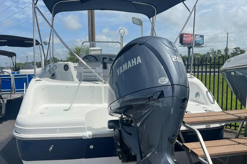 Slide: The Image of 2024 Hurricane Center Console SS 231 OB with Yamaha 200 outboard motor. - 2