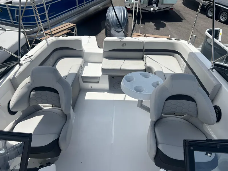 Slide: The Image of 2024 Hurricane Center Console SS 231 OB boat interior with seating and table. - 6