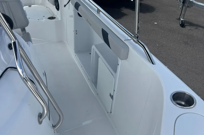 Slide: The Image of 2024 Hurricane Center Console SS 231 OB boat interior with storage and seating. - 9