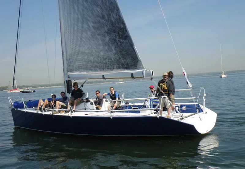 The Image of Sailing on a 2001 Ker 11.3 yacht with crew on calm waters. - 0