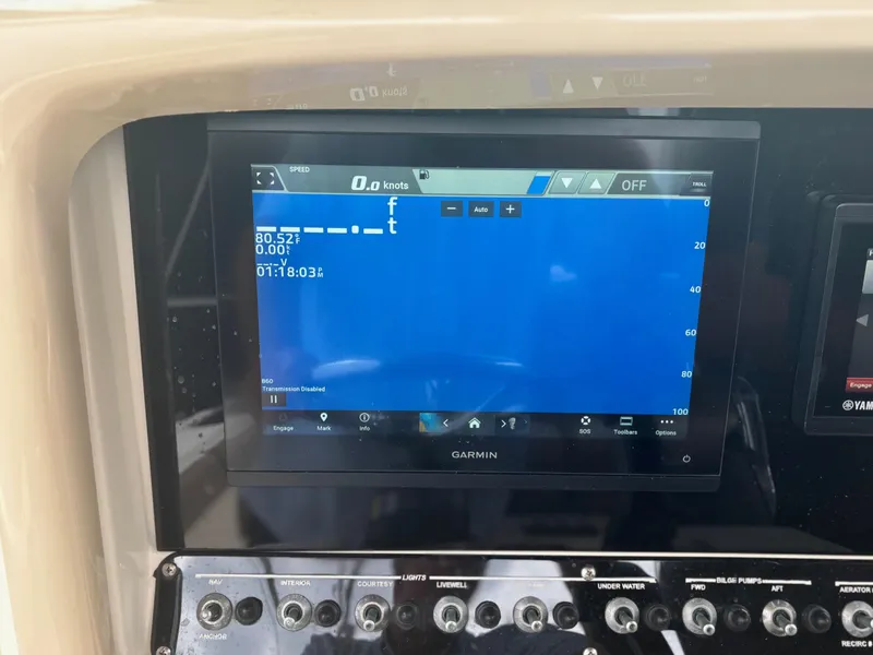 Slide: The Image of Garmin display on 2013 Scout 275 LXF boat dashboard showing navigation data. - 17