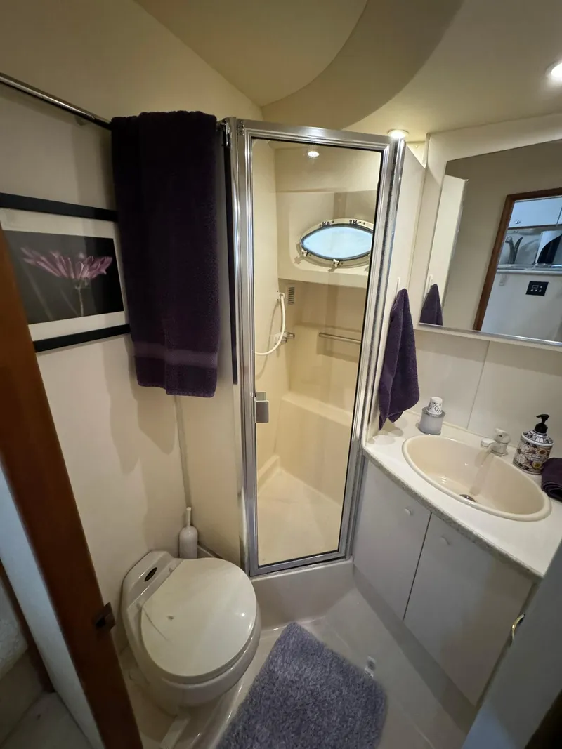 Slide: The Image of Bathroom interior of a 1989 Sea Ray 39 yacht with shower and sink. - 21