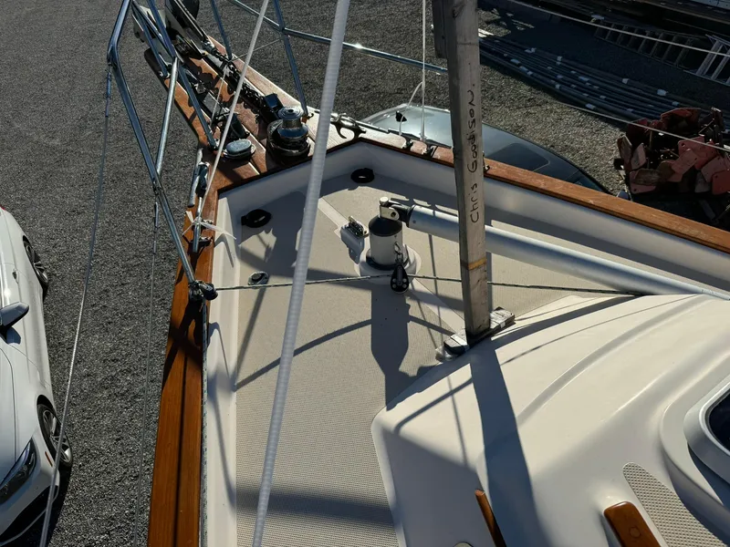 Slide: The Image of Deck view of 1998 Island Packet 40 sailboat with wooden trim and rigging. - 12