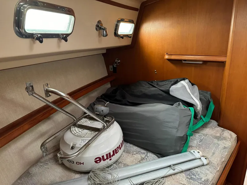 Slide: The Image of Interior cabin of 1998 Island Packet 40 sailboat with equipment and storage. - 29