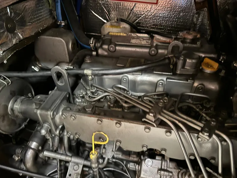 Slide: The Image of Engine of a 1998 Island Packet 40 sailboat, detailed view. - 44