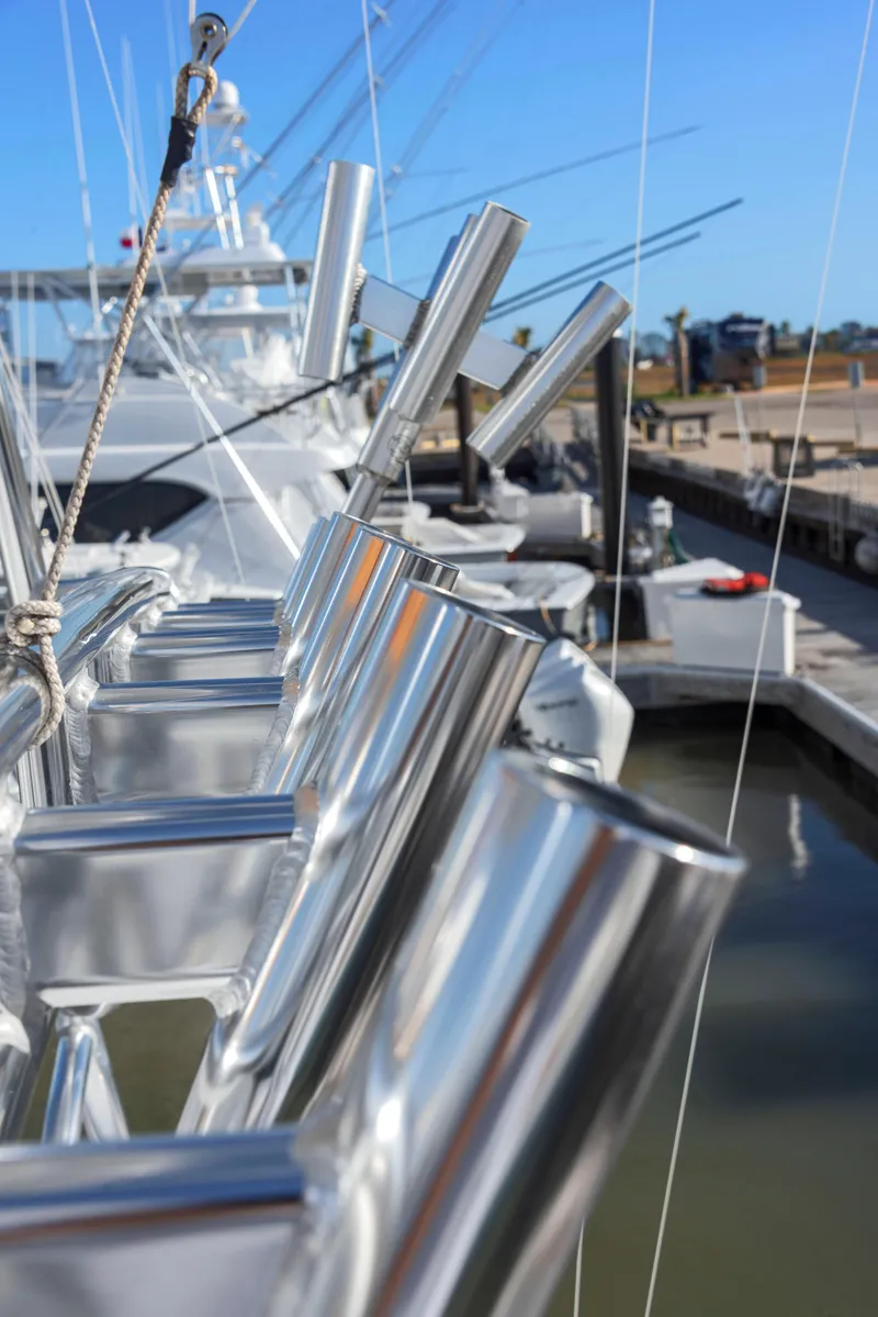 Slide: The Image of Close-up of fishing rod holders on a 1963 Whiticar 54 Sportfisherman boat. - 19