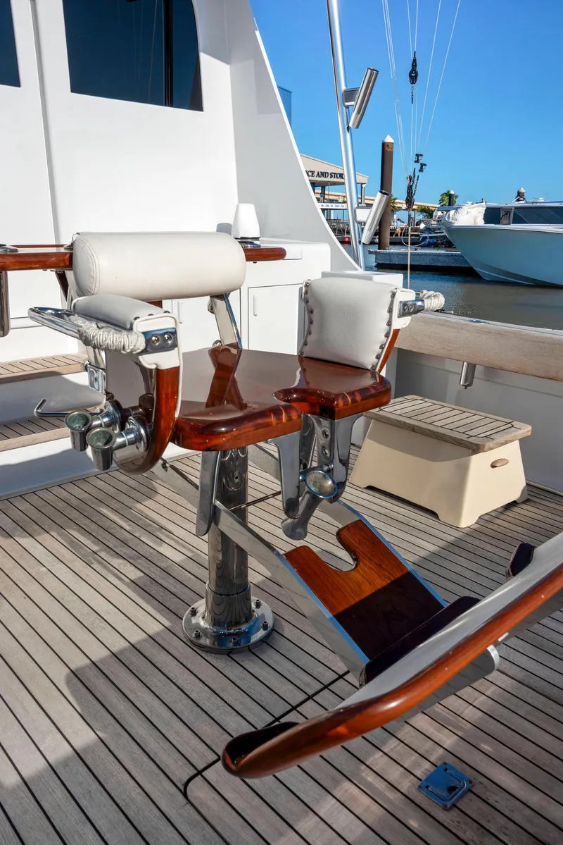 Slide: The Image of Vintage 1963 Whiticar 54 Sportfisherman boat with classic wooden fishing chair. - 20