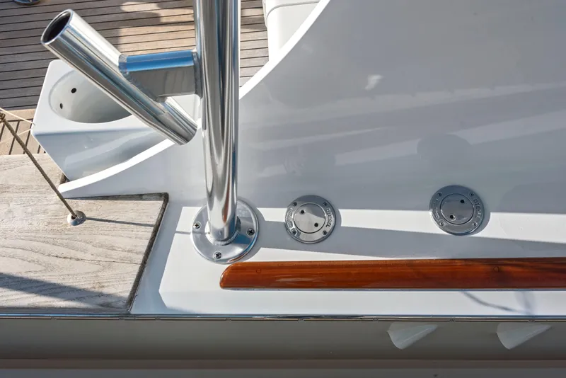 Slide: The Image of Close-up of 1963 Whiticar 54 Sportfisherman deck details with metal fixtures. - 25