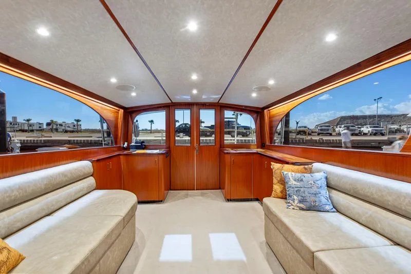 Slide: The Image of Luxurious interior of 1963 Whiticar 54 Sportfisherman yacht with plush seating and wood finish. - 30