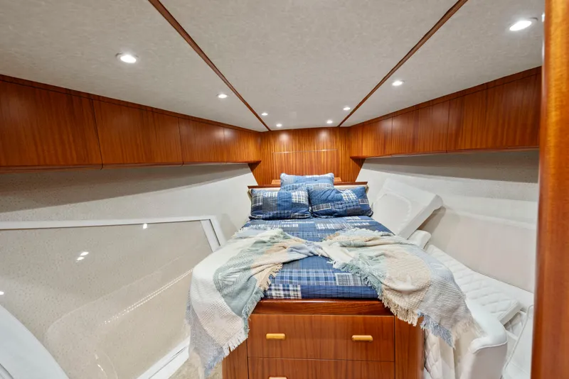 Slide: The Image of Cozy cabin interior of 1963 Whiticar 54 Sportfisherman with wood paneling and bed. - 45