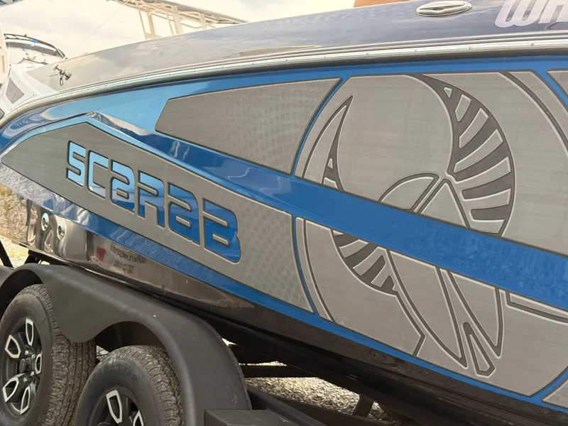 Slide: The Image of Scarab 235 Open LX Wake 2025 - 4