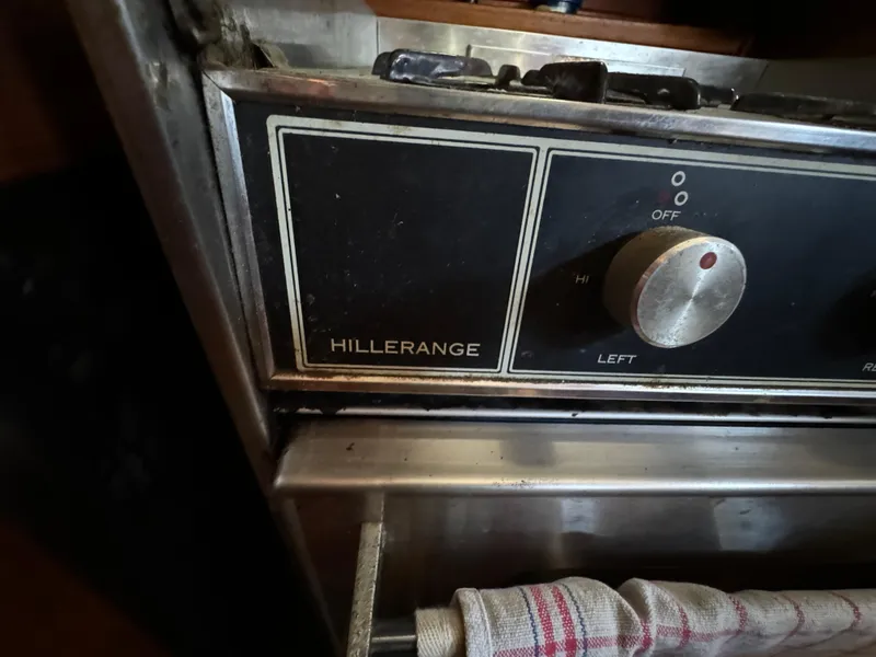 Slide: The Image of Hillerange stove control panel on 1984 Transpacific Marine Ketch. - 49