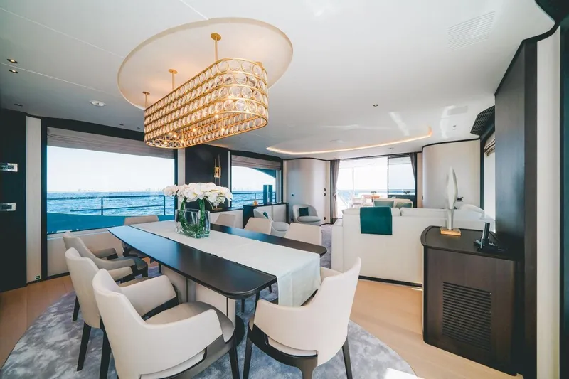 Slide: The Image of Luxurious interior of 2020 Benetti Delfino 95 yacht with elegant dining area and ocean view. - 35