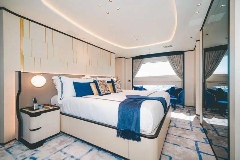 Slide: The Image of Luxurious bedroom interior of 2020 Benetti Delfino 95 yacht with elegant decor and large windows. - 39