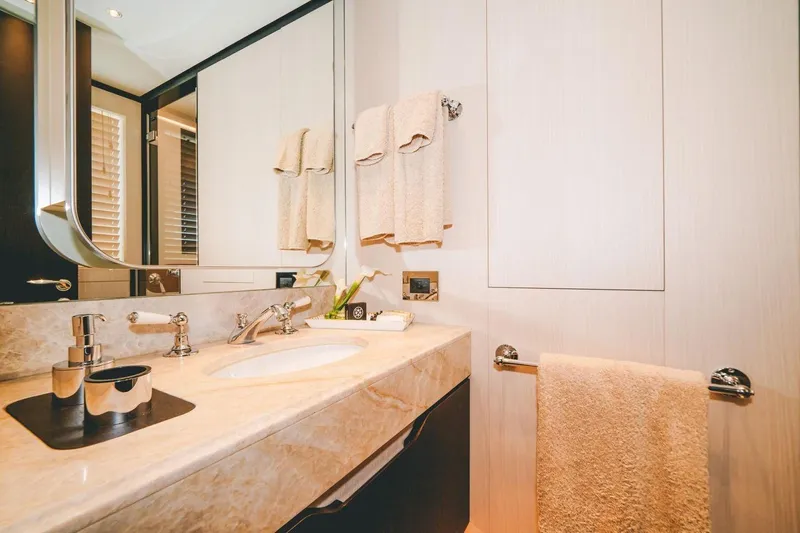 Slide: The Image of Luxurious bathroom in 2020 Benetti Delfino 95 yacht with elegant fixtures and marble countertop. - 47