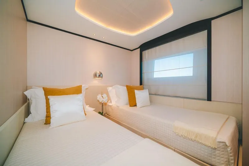 Slide: The Image of Luxurious twin bedroom on 2020 Benetti Delfino 95 yacht, featuring modern design and cozy ambiance. - 48