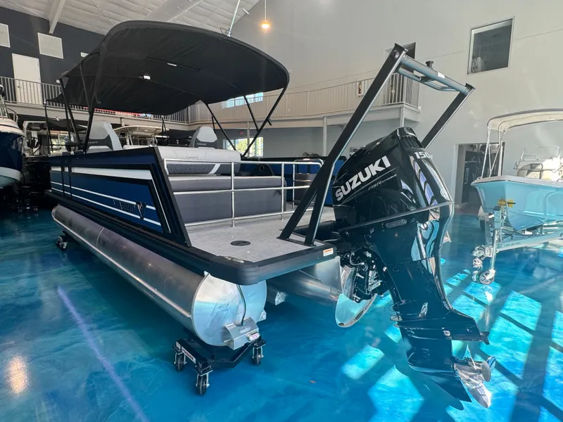 Slide: The Image of 2025 Viaggio Lago Z-S pontoon boat with Suzuki outboard motor in showroom. - 11