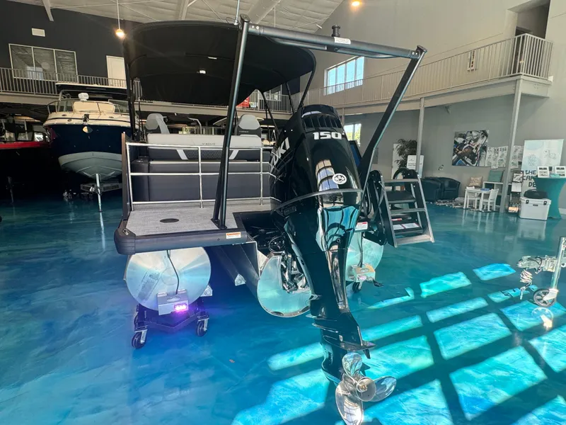 Slide: The Image of 2025 Viaggio Lago Z-S boat with powerful outboard motor in showroom. - 12