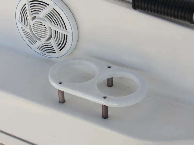 Slide: The Image of Cup holder and speaker on 2003 Cruisers Yachts 2870 Express boat. - 22