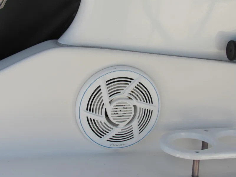 Slide: The Image of White Pioneer speaker on 2003 Cruisers Yachts 2870 Express boat interior. - 30