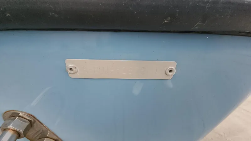 Slide: The Image of 2019 Mako 284 CC boat hull with identification plate. - 22