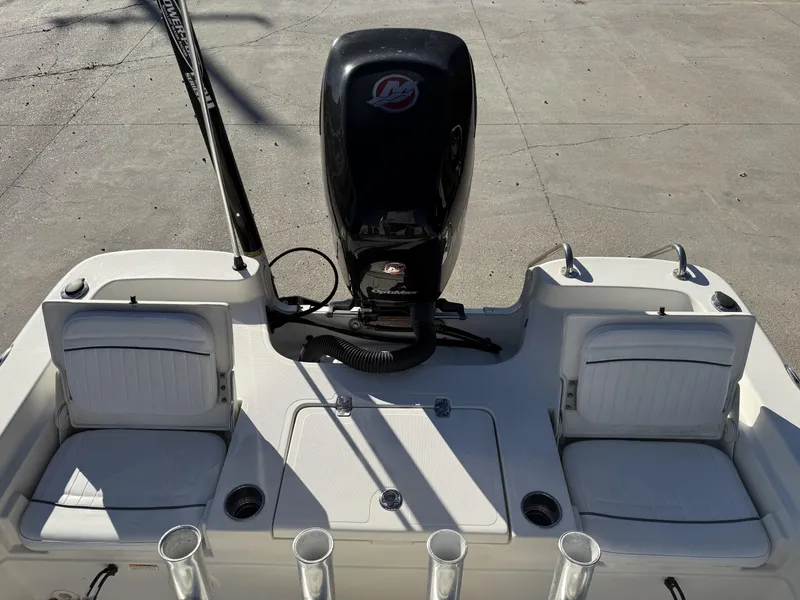 Slide: The Image of 2013 NauticStar 2200 T boat with motor and seating, viewed from above. - 4