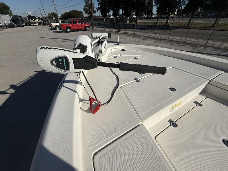 Slide: The Image of 2013 NauticStar 2200 T boat with trolling motor on deck. - 7