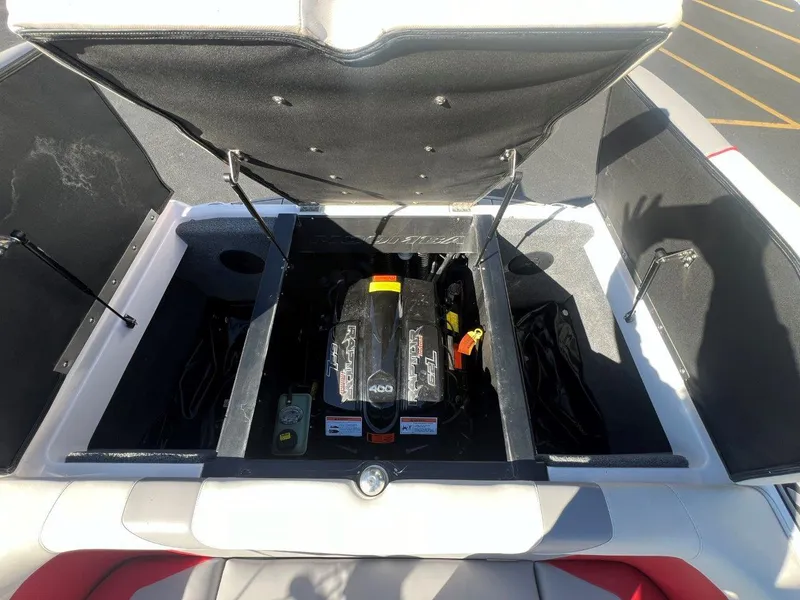 Slide: The Image of 2019 Moomba Mojo boat engine compartment with Raptor 400 engine. - 19