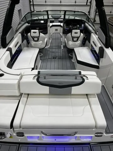 Slide: The Image of 2024 Chaparral 287 SSX boat interior with luxurious seating and modern design. - 12