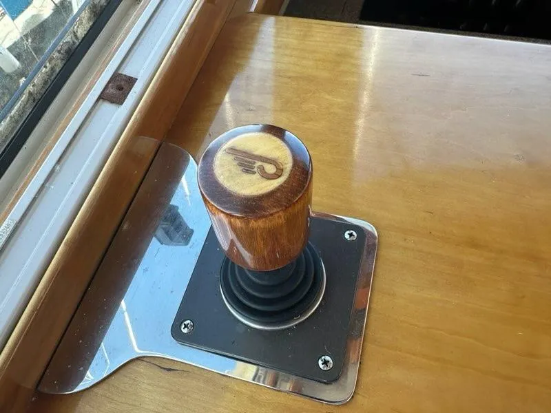 Slide: The Image of Wooden throttle lever on 2003 Hinckley Talaria 44 FB yacht. - 11